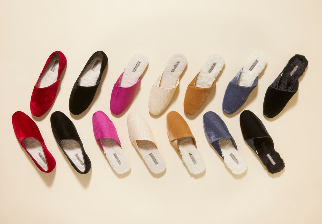 Luvons stylish washable slippers for women in velvet and raffia finishes, shown in ruby, camel, cream, black. raspberry, and slate blue. 